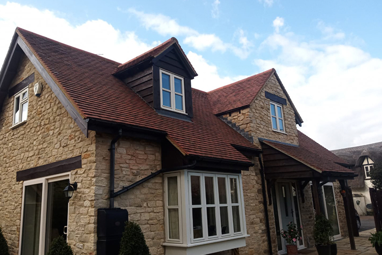 A Clean roof after roof cleaning by The Roof Moss Cleaners